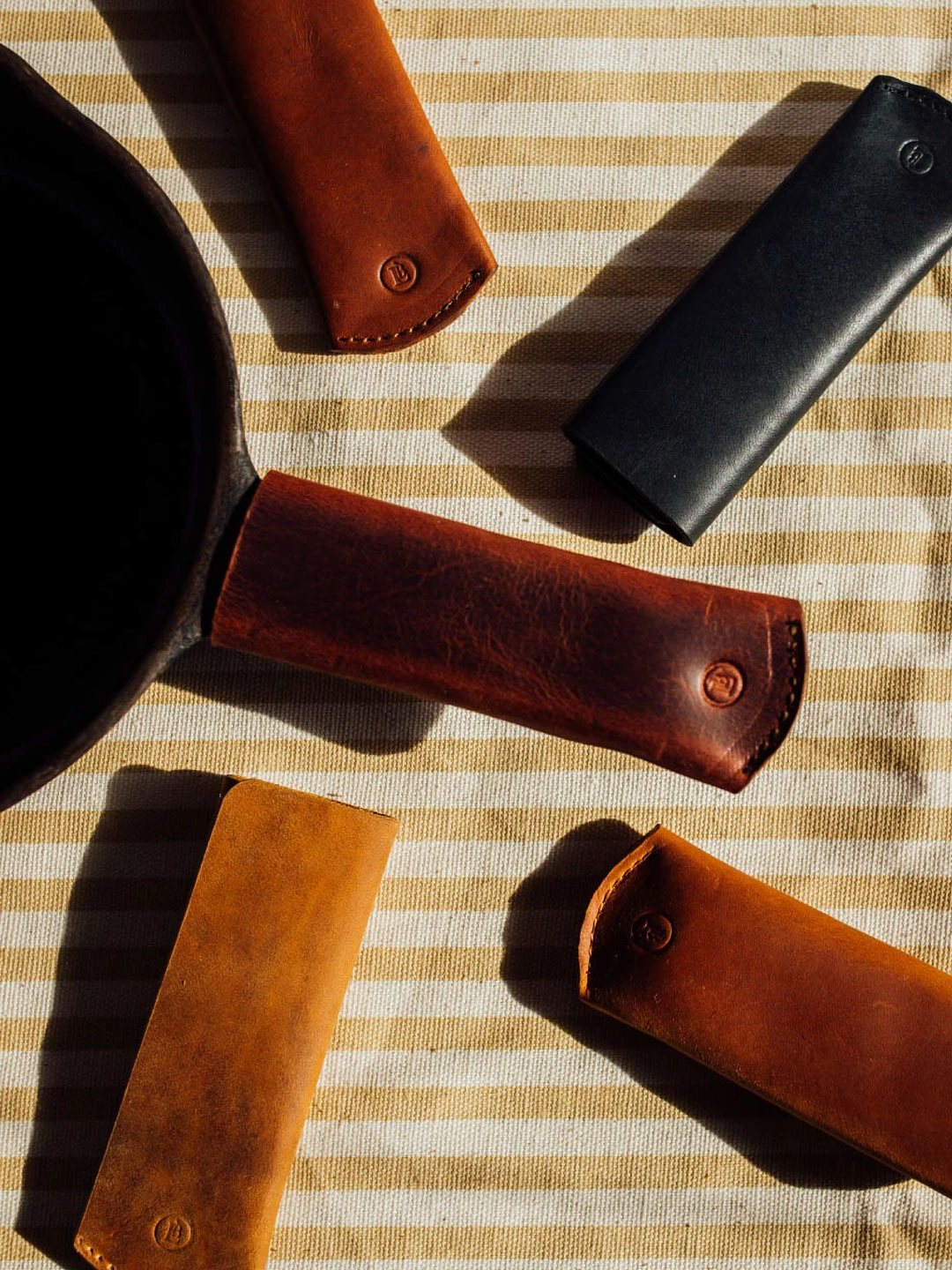 Knife rolls on striped cloth