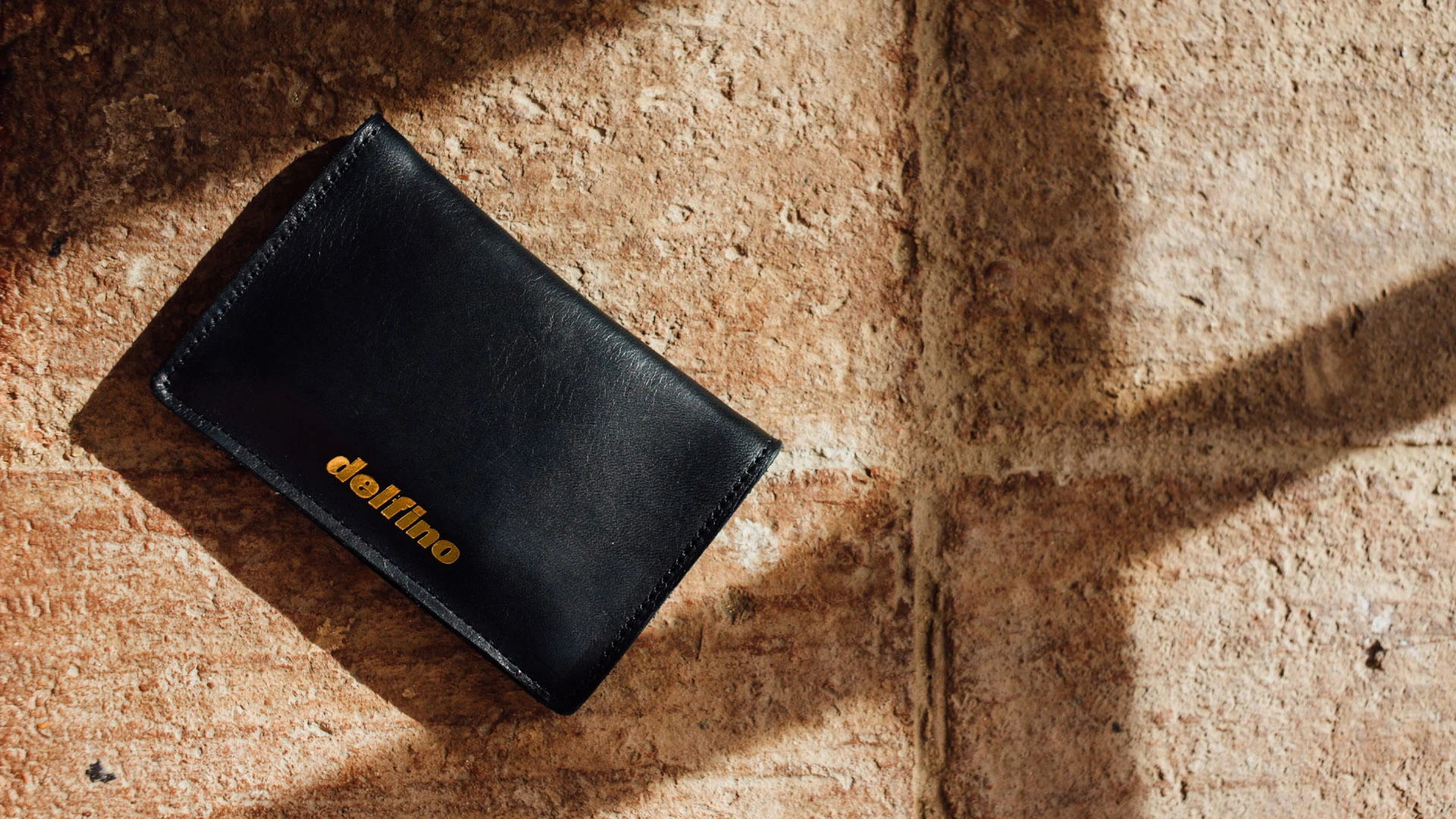 Leather wallet on stone