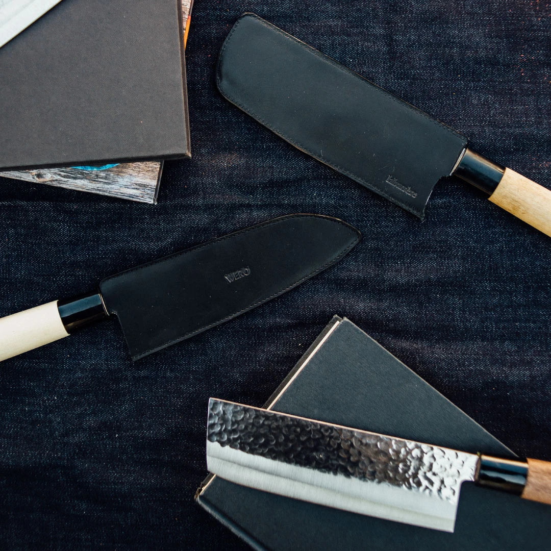 Knife and notebook on denim